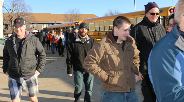 ETC employees arrive at theater